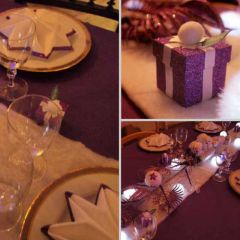 Table composée d'une nappe violette, d'un chemin de table imitation neige avec lumières, de servie[…]